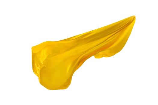 Smooth elegant transparent yellow cloth isolated or separated on white studio background. Texture of flying fabric.