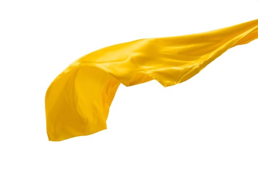 Smooth elegant transparent yellow cloth isolated or separated on white studio background. Texture of flying fabric.