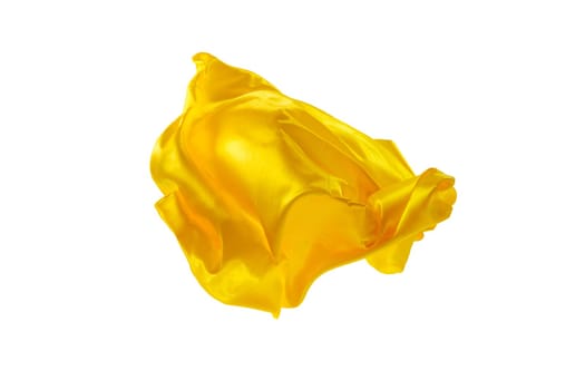 Smooth elegant transparent yellow cloth isolated or separated on white studio background. Texture of flying fabric.