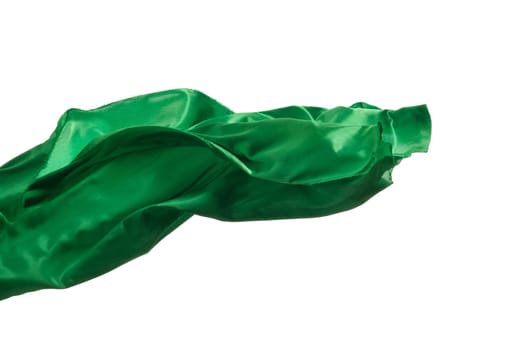 Smooth elegant transparent green cloth isolated or separated on white studio background. Texture of flying fabric.