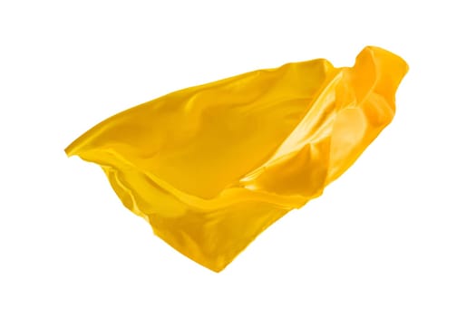 Smooth elegant transparent yellow cloth isolated or separated on white studio background. Texture of flying fabric.