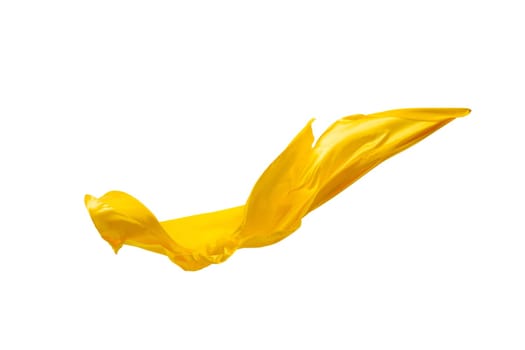 Smooth elegant transparent yellow cloth isolated or separated on white studio background. Texture of flying fabric.