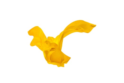 Smooth elegant transparent yellow cloth isolated or separated on white studio background. Texture of flying fabric.