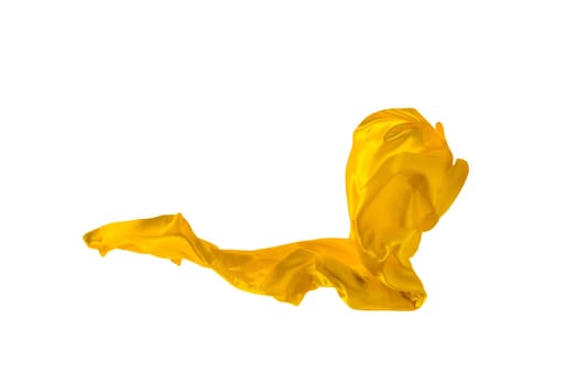 Smooth elegant transparent yellow cloth isolated or separated on white studio background. Texture of flying fabric.
