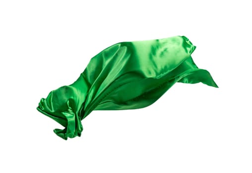 Smooth elegant transparent green cloth isolated or separated on white studio background. Texture of flying fabric.