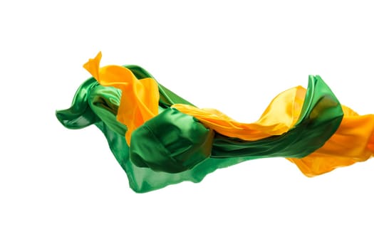 Smooth elegant transparent yellow, green cloth isolated or separated on white studio background. Texture of flying fabric.