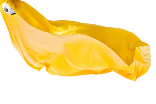 Soccer ball and Smooth elegant transparent yellow cloth isolated or separated on white studio background. Texture of flying fabric. yellow. Attributes of popular game. Concept of national flag color