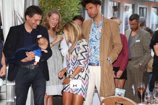 Sylvie Meis with baby Alexander Lucien Rienau and David Rienau,Andre Borchers,at the RTL Summer Festival in Hamburg / Archive photos