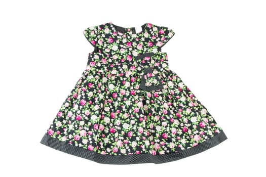 Fashionable dress of the little girl. Beauty and style in children's clothing.On a white background