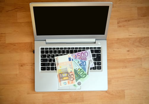 still life- computer keyboard with euro bank notes
