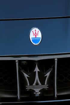 Monte-Carlo, Monaco - March 17, 2018:  Shining Maserati Logos (Emblem) on The Blue Car Hood at Monte-Carlo, Monaco. Closeup View