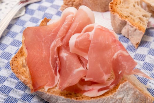 Traditional portuguese dry cured ham with Alentejo bread.