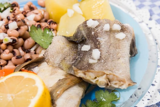 Traditional portuguese meal of cowpeas with cod fish, potato and egg.