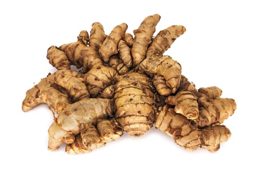 Ginger,close-up of magnificent root on a white background