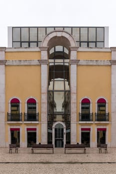 View of a tall and modern historical building in Faro city.