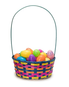 Easter eggs in basket isolated on white background