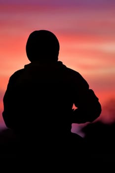young man in the sunset