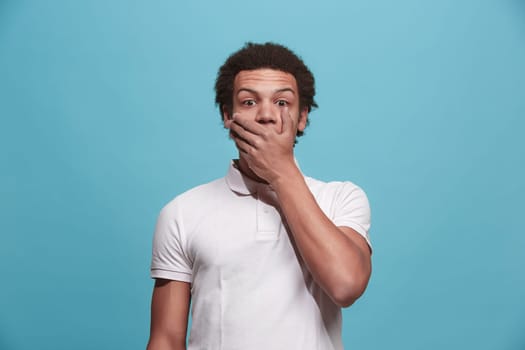 Wow. Attractive male half-length front portrait on pink studio backgroud. Young emotional surprised bearded man standing with open mouth. Human emotions, facial expression concept. Trendy colors