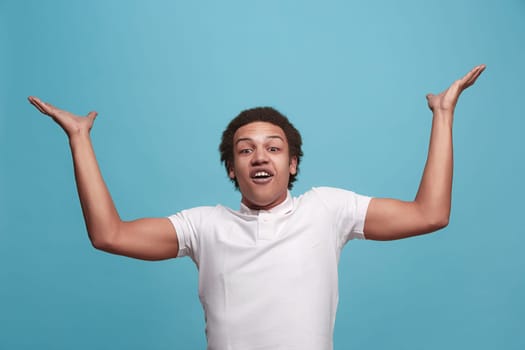 Wow. Attractive male half-length front portrait on pink studio backgroud. Young emotional surprised bearded man standing with open mouth. Human emotions, facial expression concept. Trendy colors