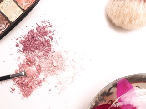 Close up of eye shadow on a white table, make up or fashion concept