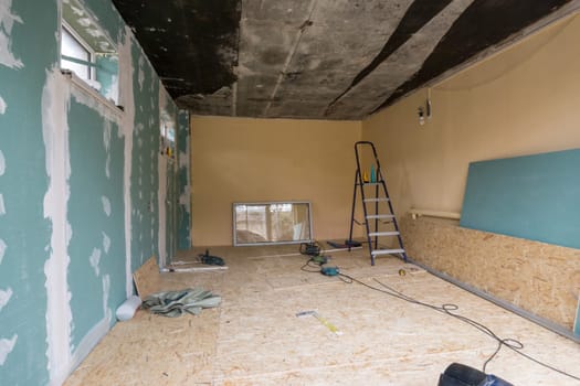 Repair in a private house, one wall is finished with plasterboard sheets