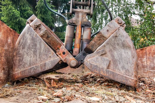 Detauil of the old and used earth grab