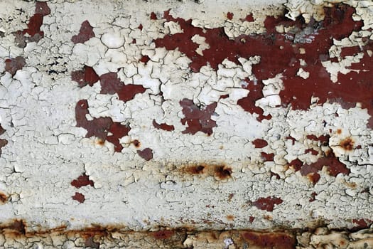 Cracked paint on rusty iron - grunge texture