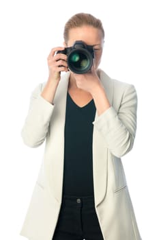 Woman photographer taking images with dslr camera isolated on white background.