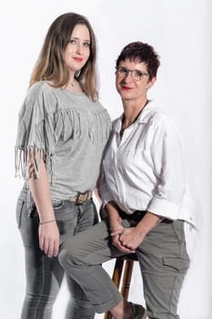 Portrait of two women standing next to each other