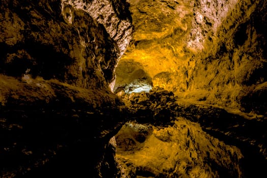 Underground lake inside volcanic cave "Cueva de los Verdes"" - Lanzarote, Canary Islands, Spain"