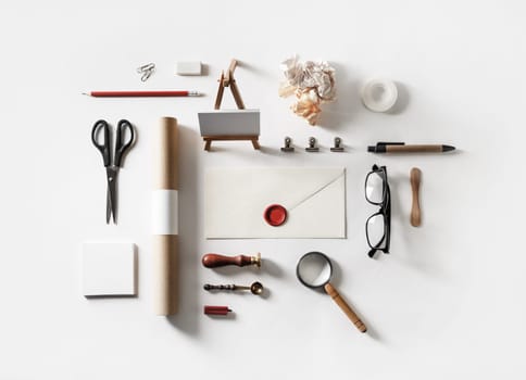 Vintage stationery set on white paper background. Blank corporate identity template. Mock up for ID. Flat lay.