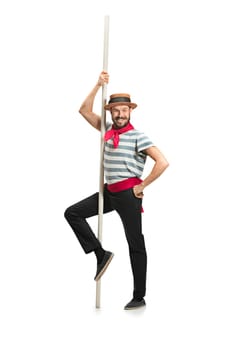 Caucasian funny bearded man in traditional gondolier costume and hat with paddle posing at studio isolated on white background. Young man shouting. Shout. Crying emotional man screaming. Human emotions, facial expression concept