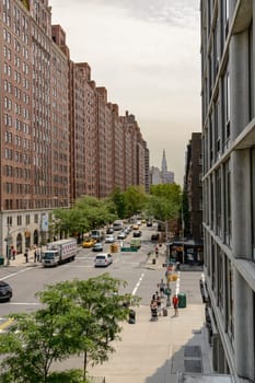 New York, NY, USA - June 8, 2015: The High Line Park in New York City, USA. It is a 2,33 km long elevated linear park, greenway and rail trail, created on a former New York Central Railroad spur on the west side of Manhattan.
