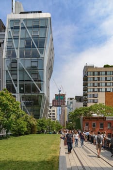 New York, NY, USA - June 8, 2015: The High Line Park in New York City, USA. It is a 2,33 km long elevated linear park, greenway and rail trail, created on a former New York Central Railroad spur on the west side of Manhattan.