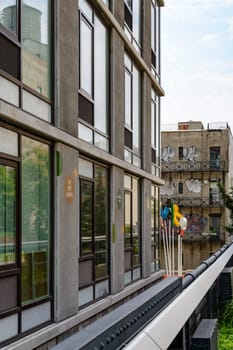 New York, NY, USA - June 8, 2015: The High Line Park in New York City, USA. It is a 2,33 km long elevated linear park, greenway and rail trail, created on a former New York Central Railroad spur on the west side of Manhattan.