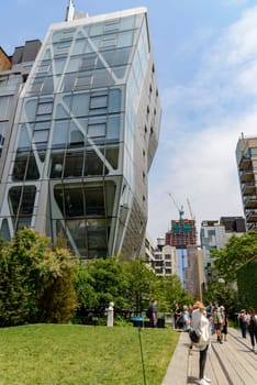New York, NY, USA - June 8, 2015: The High Line Park in New York City, USA. It is a 2,33 km long elevated linear park, greenway and rail trail, created on a former New York Central Railroad spur on the west side of Manhattan.