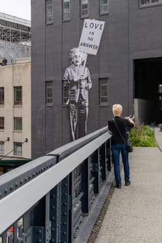 New York, NY, USA - June 8, 2015: The High Line Park in New York City, USA. It is a 2,33 km long elevated linear park, greenway and rail trail, created on a former New York Central Railroad spur on the west side of Manhattan.