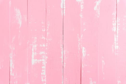 Pastel white and pink wooden table background texture.
