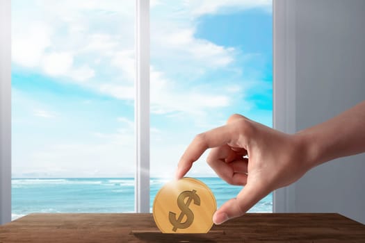 People hands put gold coin in to savings. Summer saving concept