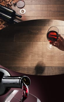 Excellent wine tasting at the bar and sommelier drinking a glass of red wine, photo collage