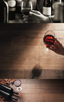 Excellent wine tasting at the bar and sommelier drinking a glass of red wine, photo collage