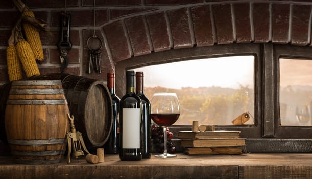 Wine glasses, bottles and barrels in a rustic countryside wine cellar  panoramic window view of lush vineyards at sunset: traditional winemaking concept