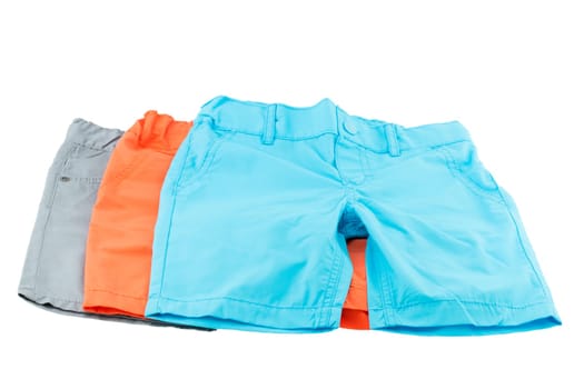 set of colorful shorts for a boy isolated on white