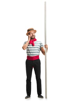 Caucasian funny bearded man in traditional gondolier costume and hat with paddle standing with mobile phone at studio isolated on white background. young man. Human emotions, facial expression concept
