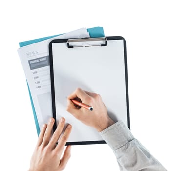 Businessman writing down notes on a  blank clipboard and financial reports, hands close up, top view
