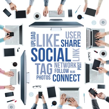 Business people social networking and using computers and touch screen tablets and smartphones, text concepts at center