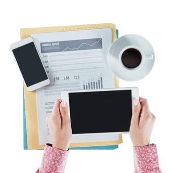 Business woman working at desk and using a digital tablet, hands close up, top view