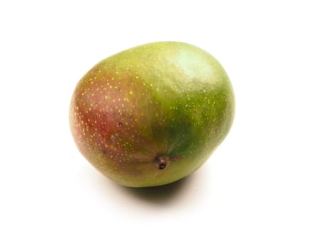 Fresh organic mango fruit on a white background, healthy eating