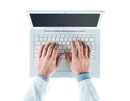 Doctor at desk working at laptop on white background, healthcare and prevention concept, top view