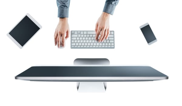 Business woman working at office desk and typing on a keyboard, white background, hands top view